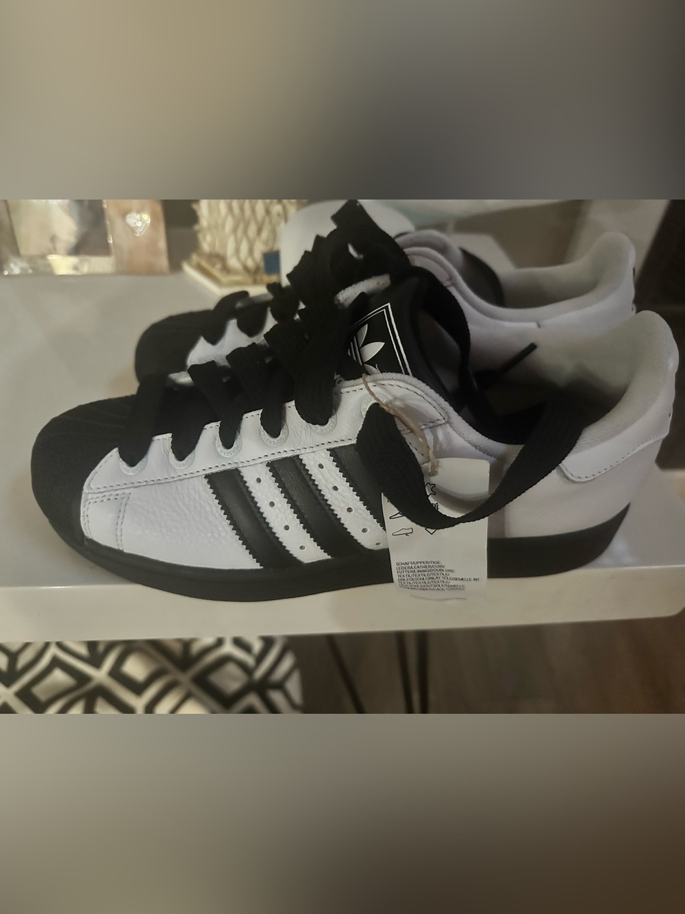 adidas Men’s White and Black Classic Shell Toe Sneakers